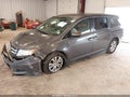 2014 Honda Odyssey — photo 2 of 16 | VIN 5FNRL5H44EB104180