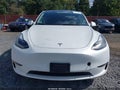 2023 Tesla Model Y — photo 12 of 19 | VIN 7SAYGDEE7PF696350