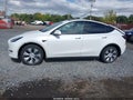 2023 Tesla Model Y — photo 14 of 19 | VIN 7SAYGDEE7PF696350