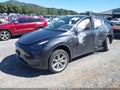 2024 Tesla Model Y — photo 2 of 15 | VIN 7SAYGDEE3RA279629