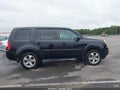 2014 Honda Pilot — photo 13 of 21 | VIN 5FNYF4H59EB047934