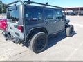 2015 Jeep Wrangler Unlimited — photo 4 of 17 | VIN 1C4BJWDG2FL598180