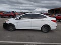 2013 Hyundai Accent — photo 14 of 16 | VIN KMHCT4AE3DU366695