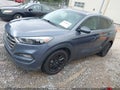 2016 Hyundai Tucson — photo 2 of 16 | VIN KM8J33A43GU075756