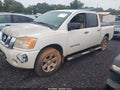 2009 Nissan Titan — photo 2 of 11 | VIN 1N6BA07D69N310519