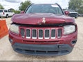 2014 Jeep Compass — photo 12 of 16 | VIN 1C4NJCCB4ED652590