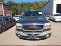 2005 GMC Sierra — photo 12 of 16 | VIN 1GTHK23U65F938564