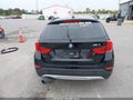 2015 BMW X1 — photo 16 of 18 | VIN WBAVL1C53FVY26912