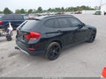 2015 BMW X1 — photo 4 of 18 | VIN WBAVL1C53FVY26912