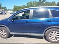 2015 Honda CR-V — photo 14 of 16 | VIN 2HKRM3H70FH517048