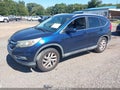2015 Honda CR-V — photo 2 of 16 | VIN 2HKRM3H70FH517048