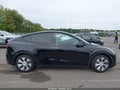 2023 Tesla Model Y — photo 15 of 15 | VIN 7SAYGDEE2PA185965