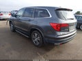 2018 Honda Pilot — photo 3 of 19 | VIN 5FNYF5H54JB025226