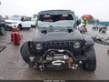 2020 Jeep Wrangler Unlimited — photo 12 of 16 | VIN 1C4HJXDG5LW207002