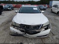 2015 Acura TLX — photo 12 of 16 | VIN 19UUB1F33FA004082