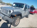2011 Jeep Wrangler Unlimited — photo 6 of 16 | VIN 1J4BA3H13BL514554