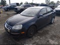 2010 Volkswagen Jetta — photo 2 of 13 | VIN 3VWJZ7AJ4AM083048