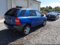 2006 Kia Sportage — photo 4 of 22 | VIN KNDJF724X67270977