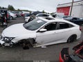 2018 Honda Civic — photo 14 of 16 | VIN 2HGFC1E5XJH704037