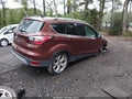 2018 Ford Escape — photo 4 of 16 | VIN 1FMCU9J9XJUA39834