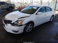 2015 Nissan Altima — photo 2 of 16 | VIN 1N4AL3AP9FC442040