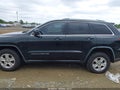 2014 Jeep Grand Cherokee — photo 14 of 16 | VIN 1C4RJFAG4EC179068