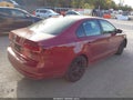 2016 Volkswagen Jetta — photo 4 of 13 | VIN 3VW267AJ4GM311443