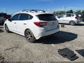 2018 Subaru Impreza — photo 3 of 16 | VIN 4S3GTAT66J3716526