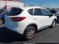 2014 Mazda CX-5 — photo 4 of 16 | VIN JM3KE2CY7E0323404