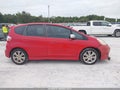 2009 Honda Fit — photo 13 of 16 | VIN JHMGE884X9S047039