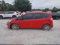 2009 Honda Fit — photo 14 of 16 | VIN JHMGE884X9S047039