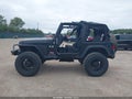 2006 Jeep Wrangler — photo 14 of 17 | VIN 1J4FA39SX6P775736