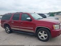 2010 Chevrolet Suburban — photo 11 of 17 | VIN 1GNUKKE37AR201554