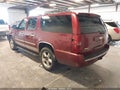 2010 Chevrolet Suburban — photo 3 of 17 | VIN 1GNUKKE37AR201554