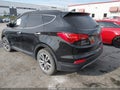 2016 Hyundai Santa Fe — photo 3 of 10 | VIN 5XYZUDLA1GG361183