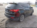 2016 Hyundai Santa Fe — photo 4 of 10 | VIN 5XYZUDLA1GG361183