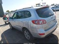 2012 Hyundai Santa Fe — photo 3 of 11 | VIN 5XYZHDAG9CG105511