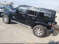 2013 Jeep Wrangler Unlimited — photo 3 of 17 | VIN 1C4HJWEG9DL592687