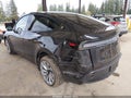 2026 Tesla Model Y — photo 3 of 16 | VIN 7SAYGDEE3TF561862