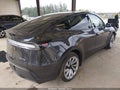 2026 Tesla Model Y — photo 4 of 16 | VIN 7SAYGDEE3TF561862