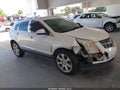 2012 Cadillac SRX — photo 14 of 17 | VIN 3GYFNBE32CS585147