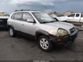 2006 Hyundai Tucson — photo 1 of 16 | VIN KM8JN12D76U370161