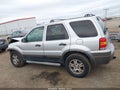 2005 Ford Escape — photo 15 of 19 | VIN 1FMYU03155KE40802