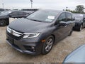 2018 Honda Odyssey — photo 2 of 21 | VIN 5FNRL6H56JB073975