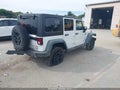2014 Jeep Wrangler Unlimited — photo 4 of 16 | VIN 1C4BJWDG1EL125305