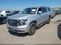 2018 Chevrolet Suburban — photo 2 of 16 | VIN 1GNSKHKCXJR393230