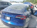 2022 Tesla Model 3 — photo 4 of 14 | VIN 5YJ3E1EB4NF184673