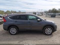 2016 Honda CR-V — photo 13 of 16 | VIN 2HKRM4H51GH711674