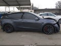 2023 Tesla Model Y — photo 13 of 18 | VIN 7SAYGDEF9PF711617