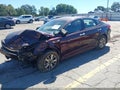 2016 Kia Optima — photo 2 of 16 | VIN 5XXGT4L31GG030846